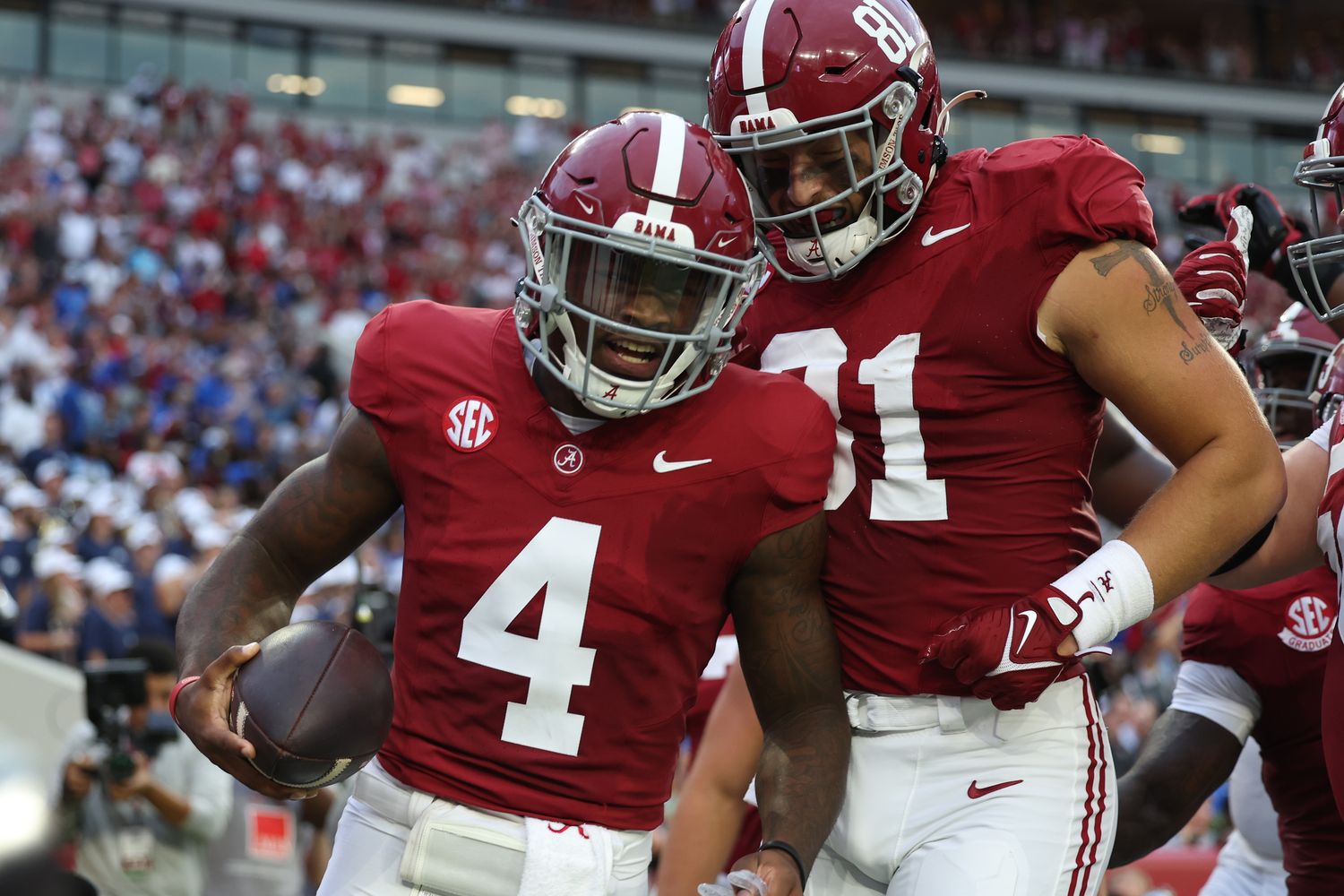Jalen Milroe and CJ Dippre celebrate touchdown